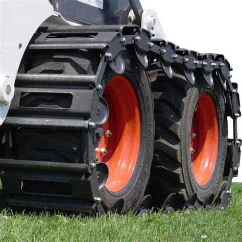 skid steer with metal track|skid steer track over wheels.